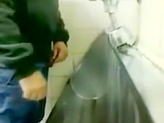 Strangers Stroking at the Urinal