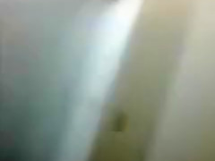 Strangers Stroking at the Urinal
