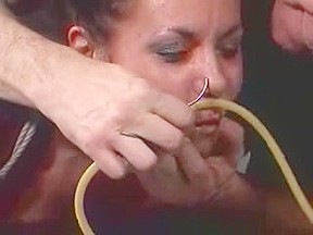 Submissive brunette enjoys a wicked BDSM session