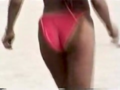 Tan lined booty hiding underneath candid pink bikini 06zi