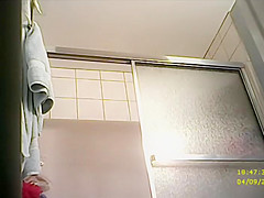 Teenage beauty showers and pisses