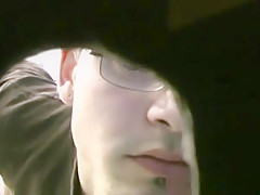 Thin gay white guy sucking off black cocks at a gloryhole