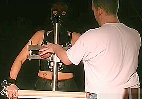 Tractable Female Endures Harsh Treatment In S&m Show