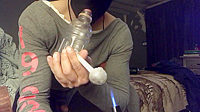 Trans smokes and plays with dildo and bottle