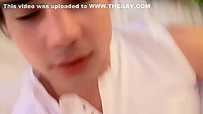 Twink tied with christmas lights wanks his big dick solo