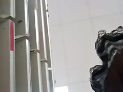 UPSKIRT--slim asian with a fat pussy peeking thru