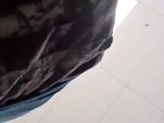 UPSKIRT--slim asian with a fat pussy peeking thru