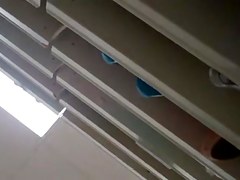 UPSKIRT--slim asian with a fat pussy peeking thru