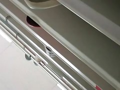 UPSKIRT--slim asian with a fat pussy peeking thru