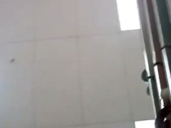 UPSKIRT--slim asian with a fat pussy peeking thru