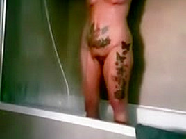 Unaware wife in shower