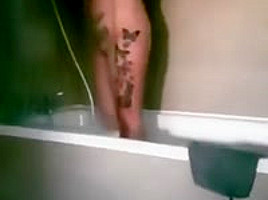 Unaware wife in shower
