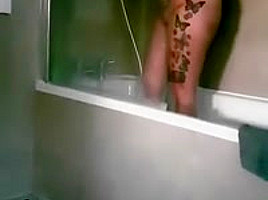 Unaware wife in shower