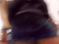 Upskirt of beauty in jeans skirt