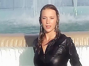 Wetlook fountain: Long black high heel boots, pantyhose, gray skirt