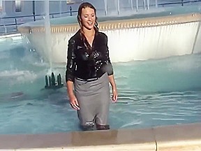 Wetlook fountain: Long black high heel boots, pantyhose, gray skirt