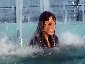 Wetlook fountain: Long black high heel boots, pantyhose, gray skirt