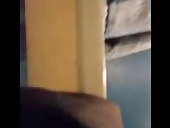 Woman is taking her clothes off in a dressing room