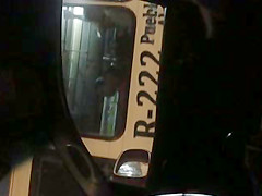 Young girl at a bus next to me