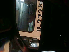 Young girl at a bus next to me