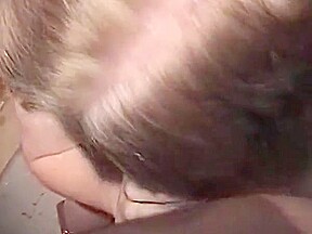 Zuchinni sucking chained milf takes load in mouth