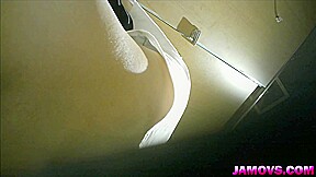 asian girl pissing in toilet