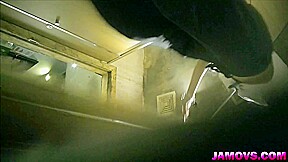asian girl pissing in toilet
