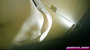 asian girl pissing in toilet