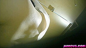 asian girl pissing in toilet