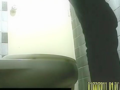 in public toilet catches woman peeing