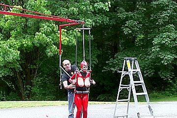 in red latex catsuit