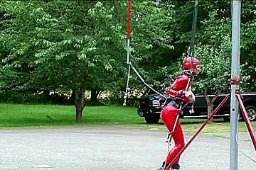 in red latex catsuit